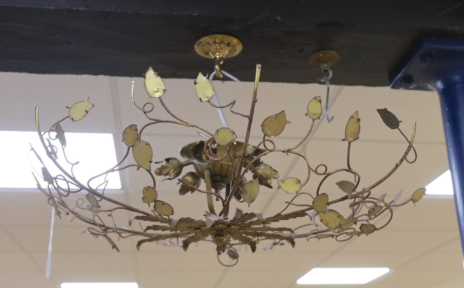 An Italian gilt metal ceiling light with leaf decoration